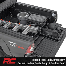 Rough Country slide-out tray extended from truck bed offering fast tailgate access
