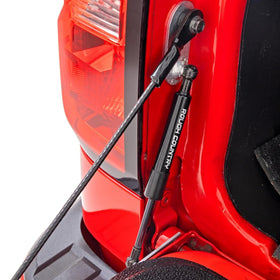 Rough Country front view of tailgate assist showing compact design and easy fit benefit