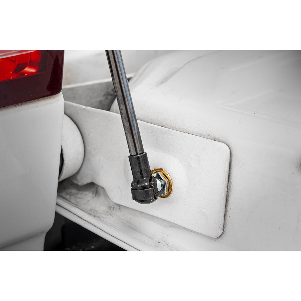 Rough Country installed on Ram tailgate demonstrating safer one-hand use