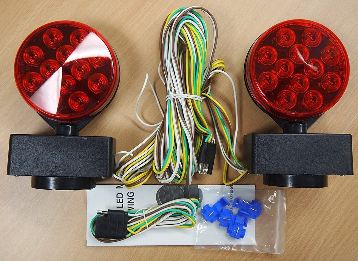 ROULER light mounted on car tail demonstrating secure magnetic attachment while towing