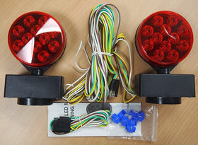 ROULER light mounted on car tail demonstrating secure magnetic attachment while towing