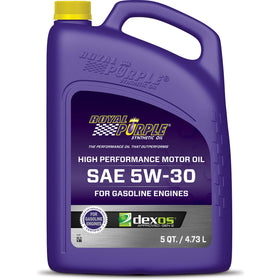 Royal Purple 51530 pouring into engine dipstick area demonstrating easy application and accurate quantity