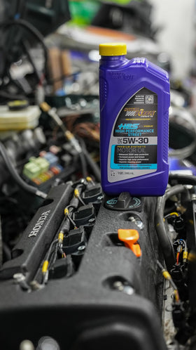Royal Purple close-up of oil pour demonstrating smooth flow and precise application benefit