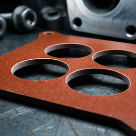 RoyalAir spacer phenolic texture closeup showing heat insulation
