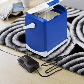 RoyPow running a car refrigerator on a countertop showing portable cooling benefit