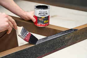 Rust-Oleum applied to vehicle wheel well demonstrating corrosion protection benefit
