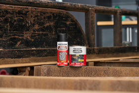 Rust-Oleum quart next to tape measure showing coverage and scale benefit