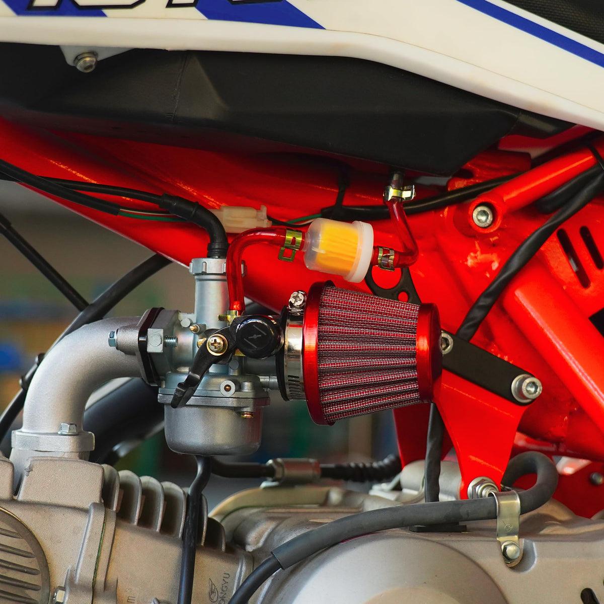RUTU PZ22 mounted on a 110cc ATV demonstrating correct fit and improved throttle response