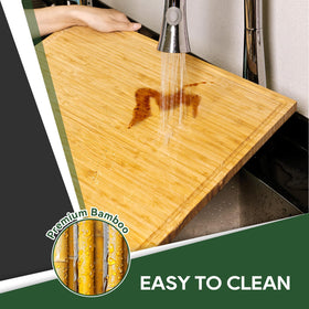 RVGUARD board over stove for scale, showing 17x20 fit and space-saving advantage