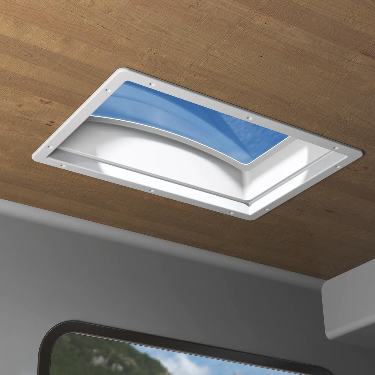 RVGUARD skylight in a parked RV letting natural light in, enhances comfort onboard