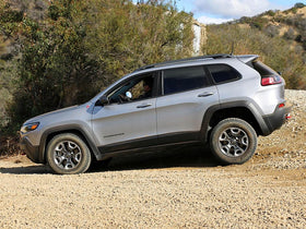 Rvinyl being applied to Jeep Cherokee pillar demonstrating quick DIY installation