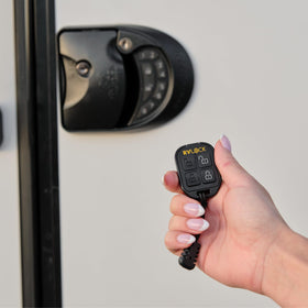 RVLock in hand to show scale and lightweight design for comfortable carry