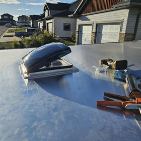 RVLOVENT installed on RV roof illustrating weatherproof cover and durable finish