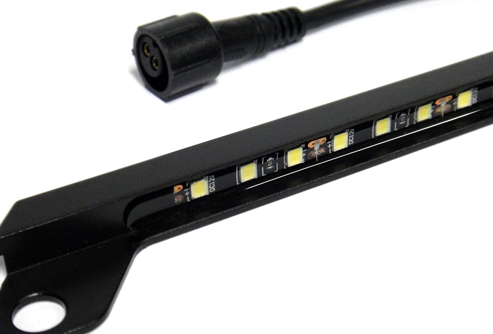 RZG lamp mounted on car at night providing even plate illumination