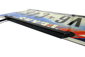 RZG lamp beside ruler illustrating slim lightweight compact dimensions