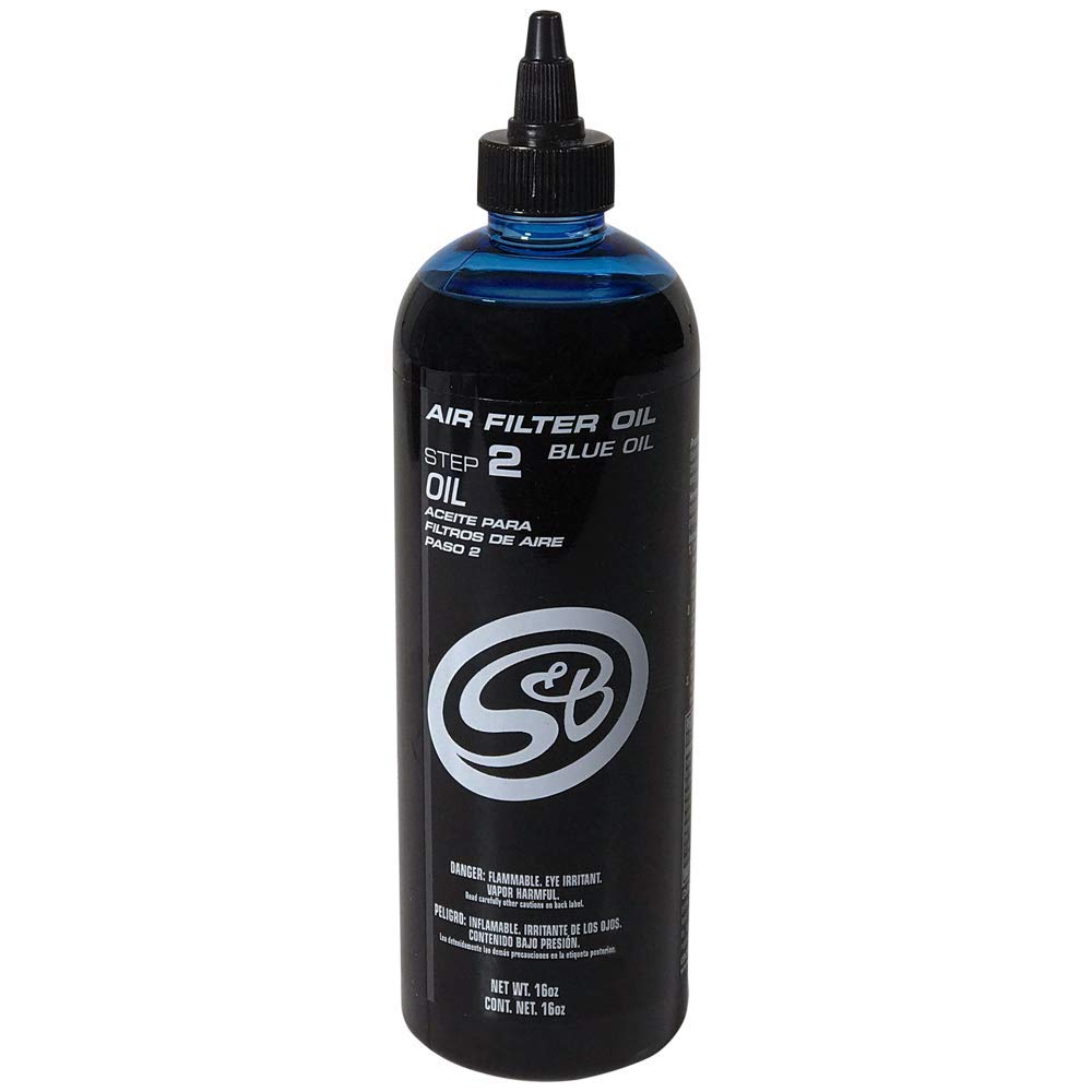 S&B blue oil applicator close-up showing calibrated measurement for accuracy