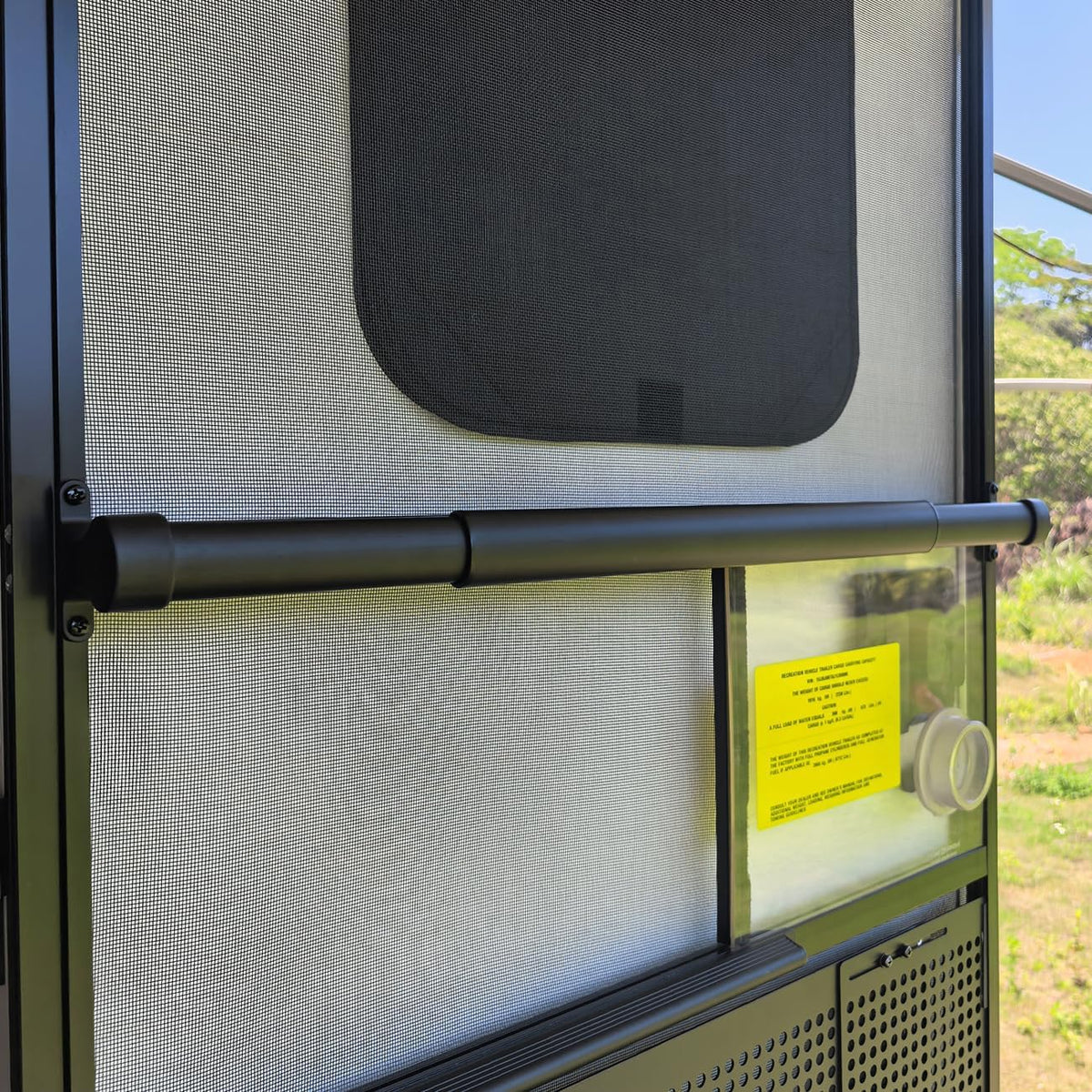 Safoner front view of the packaged aluminum RV screen door handle showing ready-to-install benefit