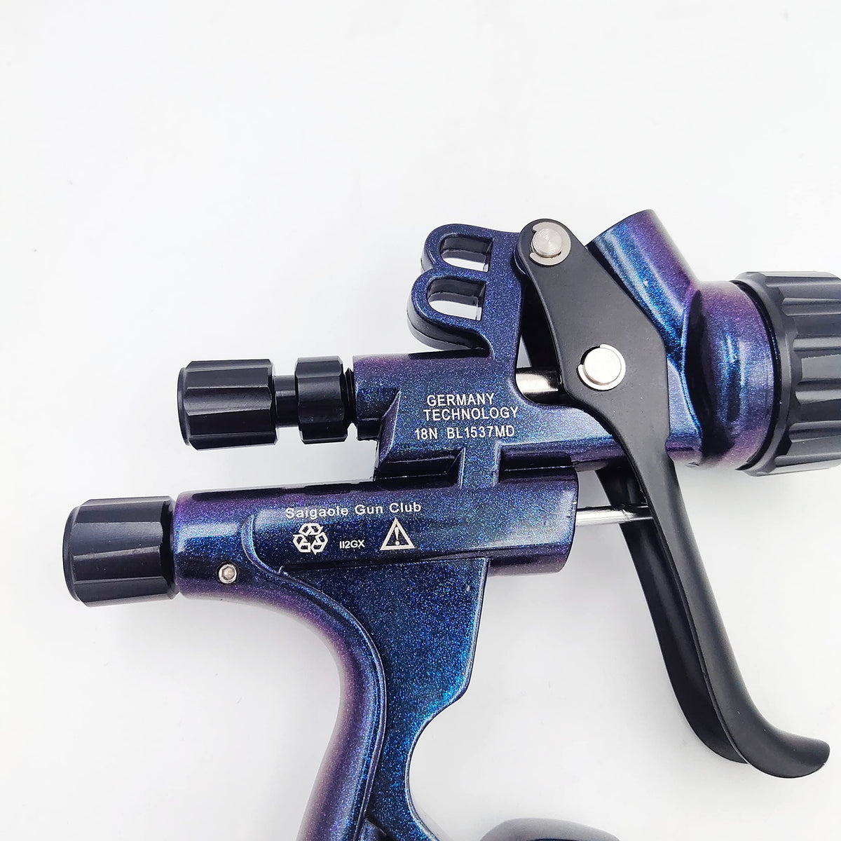 saigaole spray gun in hand for scale showing lightweight build and comfortable balance