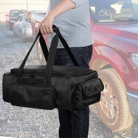 samdew bag beside tools showing scale and capacity for jumper cables benefit