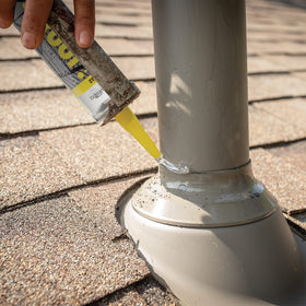 Sashco clear seal on flashing demonstrating long-lasting adhesion