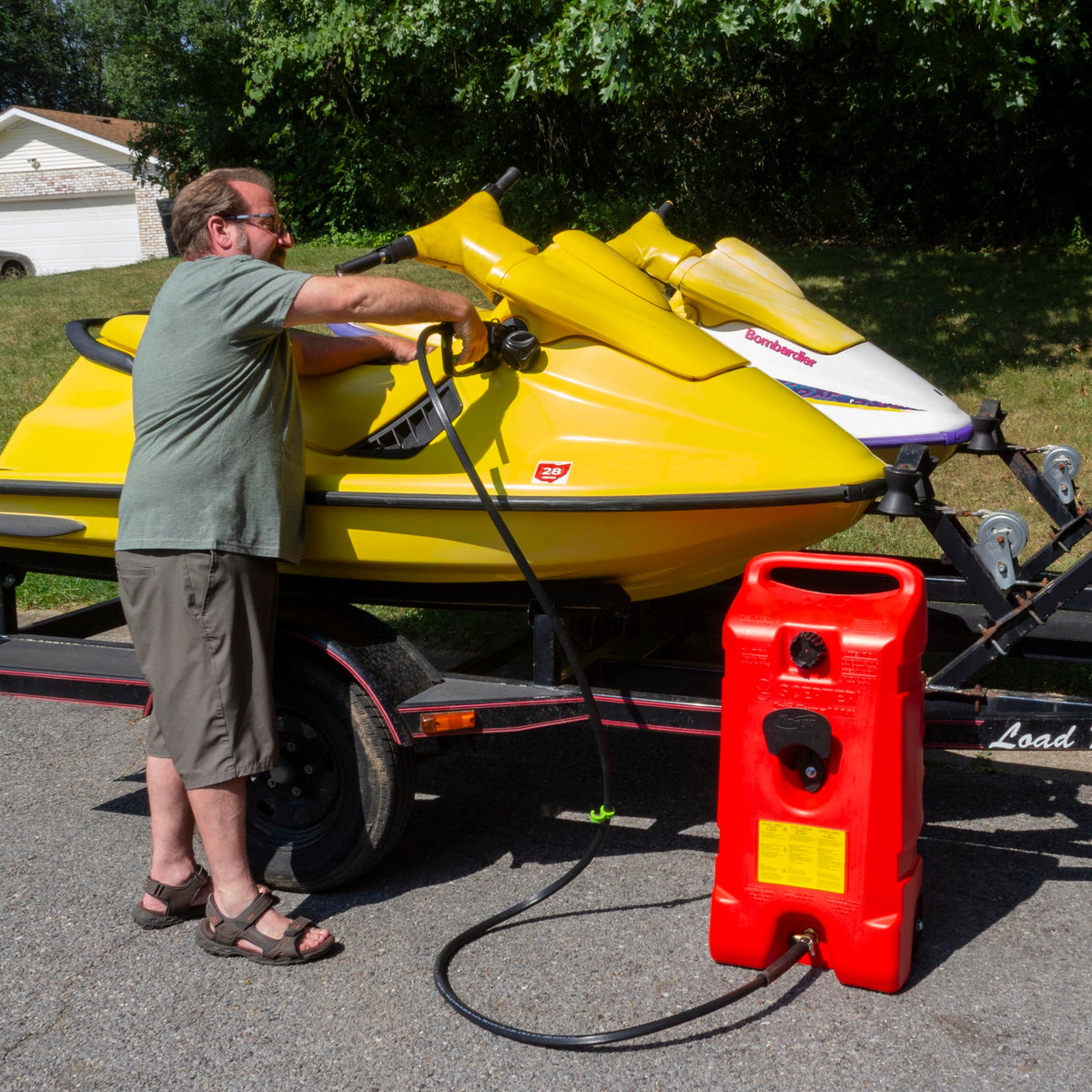 scepter close-up of hose and nozzle for clean extended reach while fueling