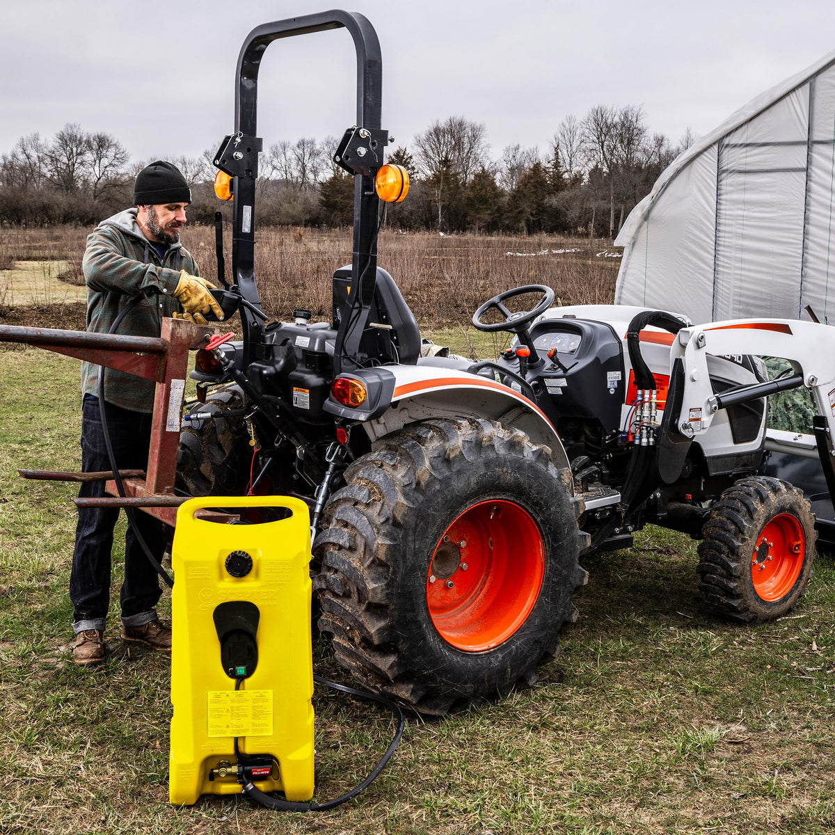 Scepter refueling a lawn tractor outdoors showing fast, on-site fueling