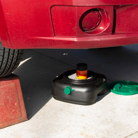 Scepter pour spout in use with tethered gasketed cap for drip-free draining