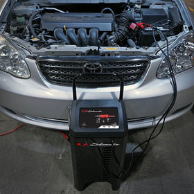 Schumacher SC1353 next to a toolbox showing scale and portability for space-saving benefit