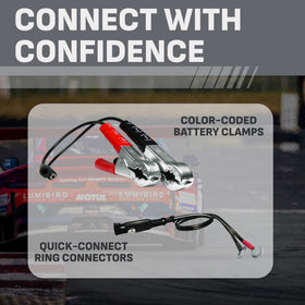 Schumacher power cord and booster leads displayed to show extended reach for garage work