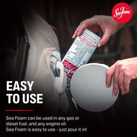 Sea Foam being added to a vehicle fuel tank to clean injectors