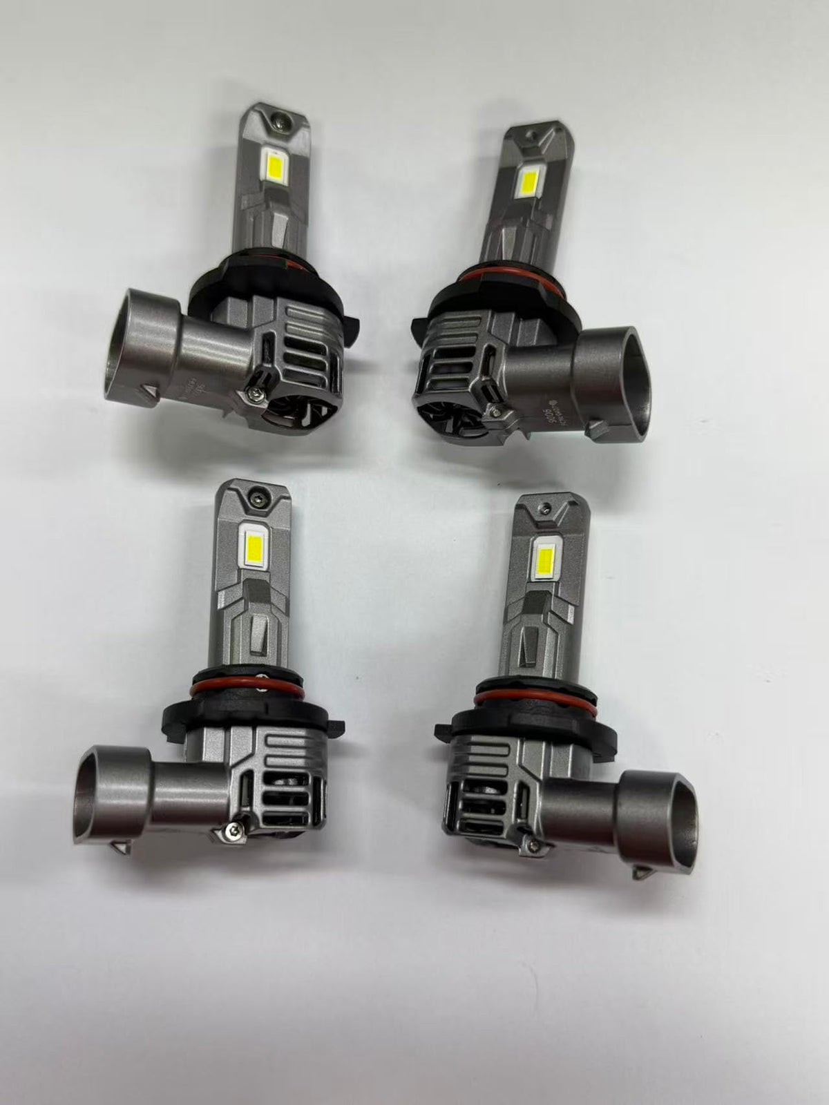 SEALIGHT beside a halogen bulb showing compact size and direct-fit advantage