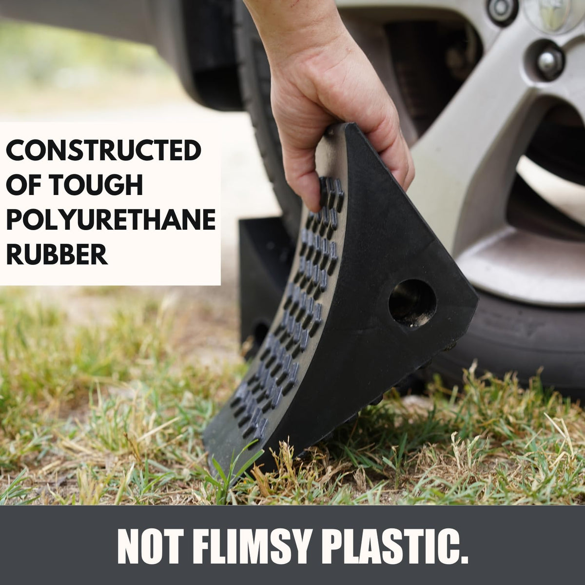 SECURITYMAN chock in use under boat trailer tire providing stability