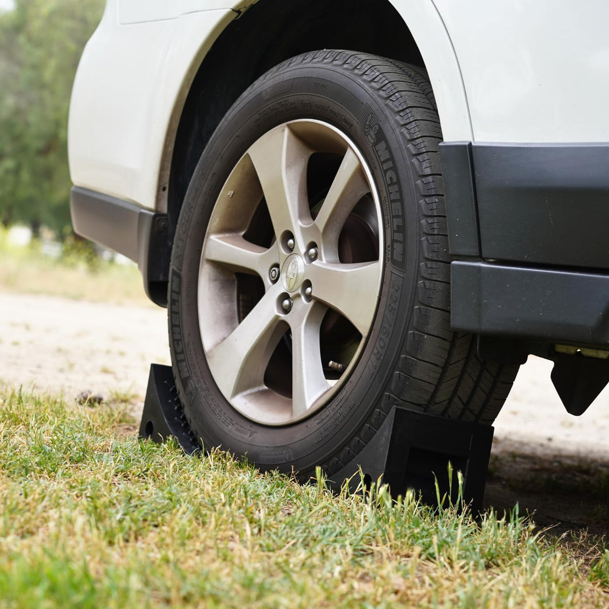 SECURITYMAN chock beside wheel showing size and secure fit