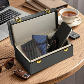 Sentinel Shield Pro red pouch on table shows easy grab-and-go protection for key fobs