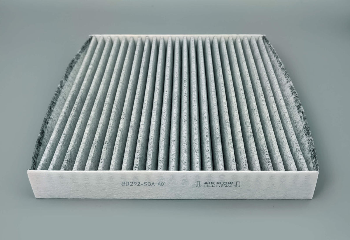 SERVKITOUR lifestyle scene of owner changing filters showing simple at-home maintenance