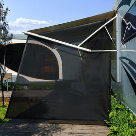 SHADEPLUS front view attached to RV awning showing larger shaded area and privacy