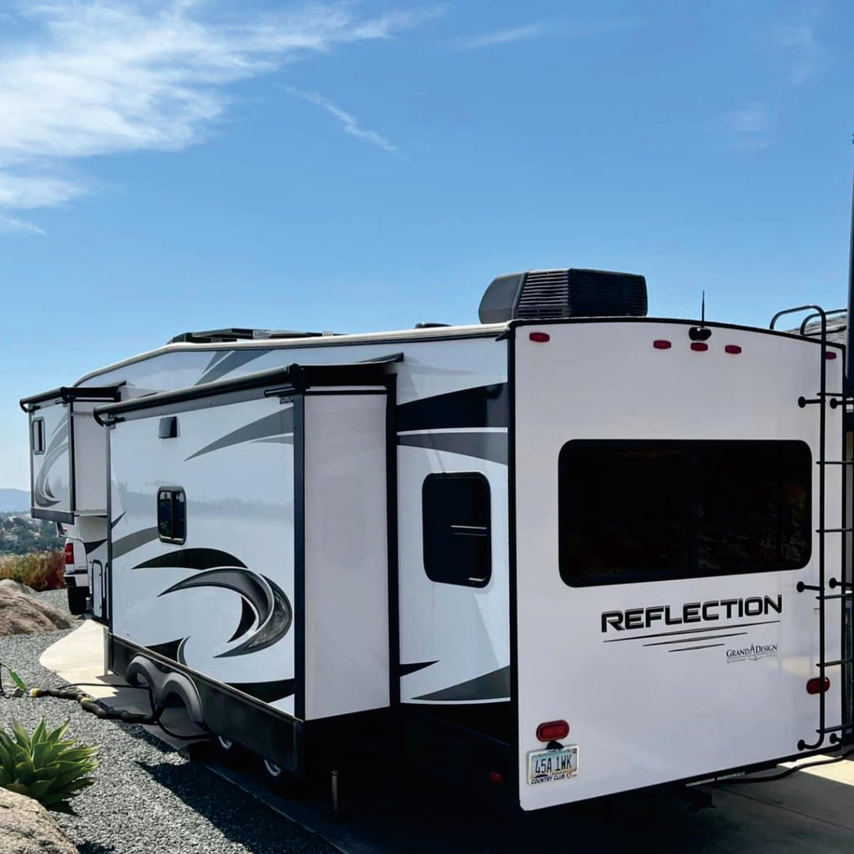 SHADEPLUS fabric on camper at campsite, improves appearance and weather protection