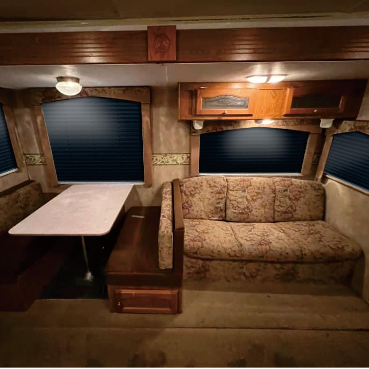 SHADEPLUS interior lifestyle shot of RV with blind lowered showing enhanced privacy and cozy atmosphere benefit