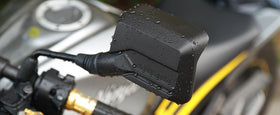 SHEJISI mirror installed on ATV demonstrating rugged build for off-road use