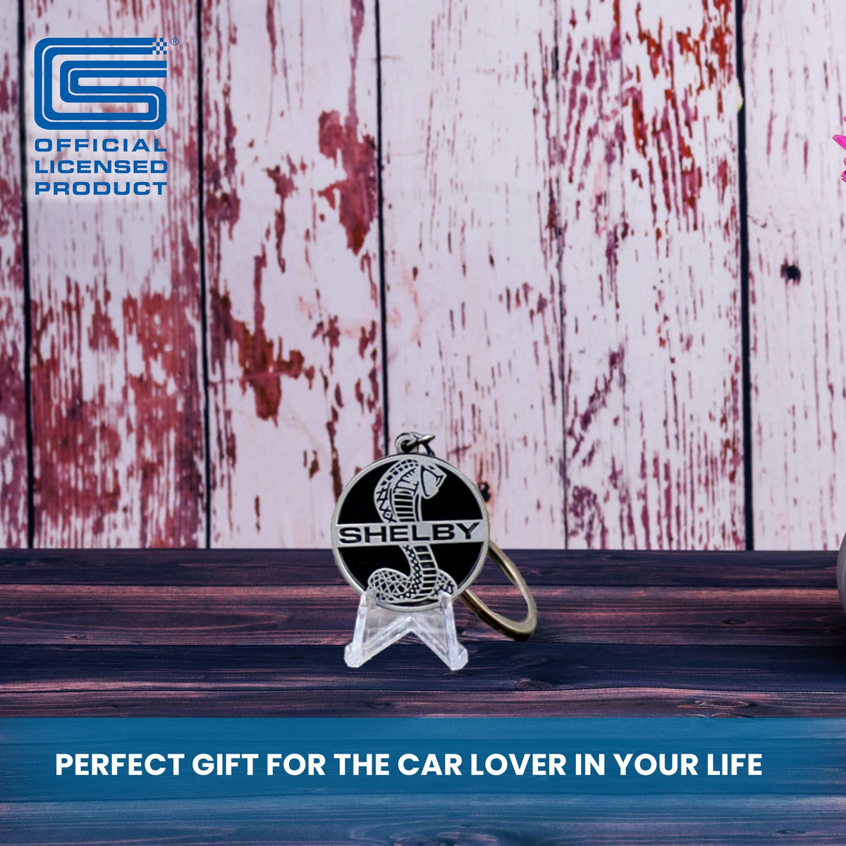 Carroll Shelby keychain held in hand to show compact size and light weight