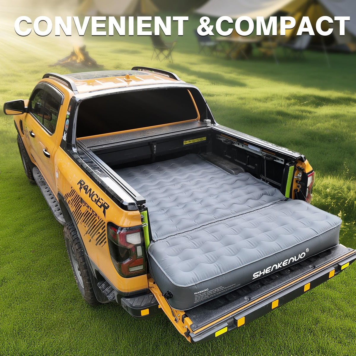 SHENKENUO fully inflated mattress in Tacoma bed providing a level, comfortable sleeping surface