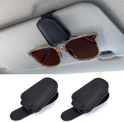 Shering front view of two black visor clips showing compact design and secure hold