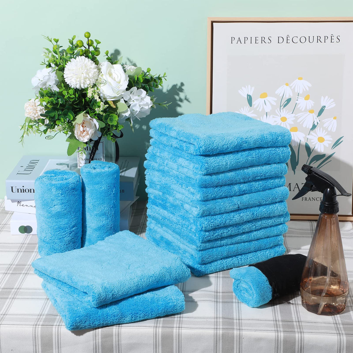 Shimeyao towel held in hand showing 16x16 size and easy handling benefit