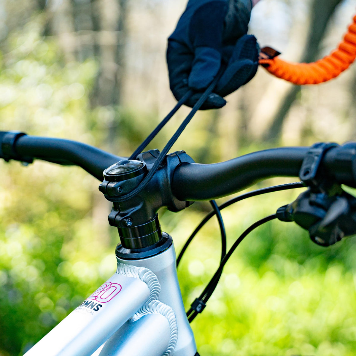SHOTGUN tow rope in use towing a child on trail showing safer family rides