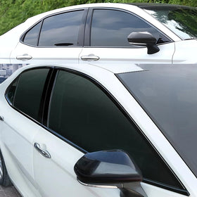 SKKYORO trims on Camry in urban driving scene showing modernized vehicle appearance