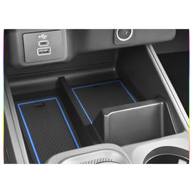 SKTU liner next to smartphone showing size and scale, keeps devices stable while driving