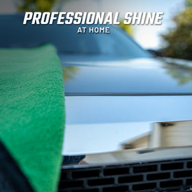 Slick Products finished vehicle after wash showing glossy paint and light wax protection