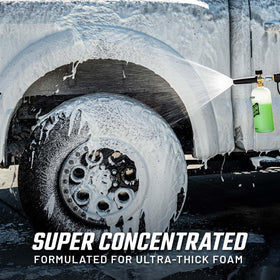 Slick Products bottle staged next to a dirt bike highlighting vehicle suitability