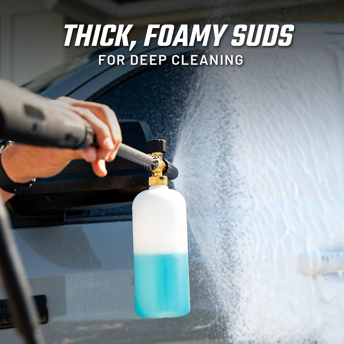 Slick Products thick white foam close-up clinging to paint for gentle dirt lift and protection