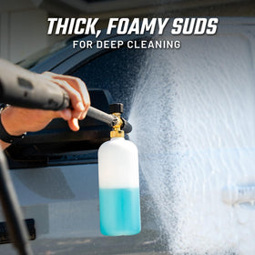 Slick Products thick white foam close-up clinging to paint for gentle dirt lift and protection